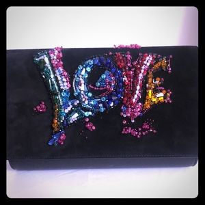 Christian Loubutin “LOVE” evening clutch